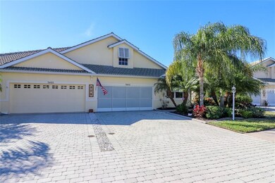 Notice the Paver Driveway, Screened Garage & Matur