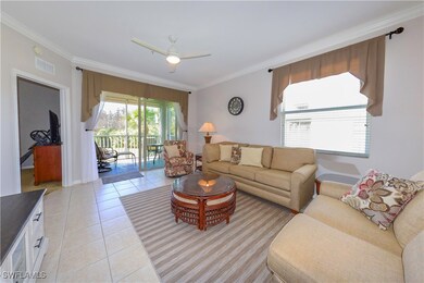 Living area with light tile patterned floors, ceil