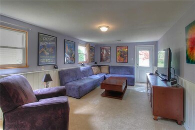 Spacious but cozy family room, perfect for hanging