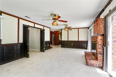 Great room with panels that where old doors, tile