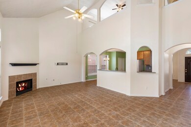 You will find the high ceilings in the Family Room as well and you can easily see it from the Kitchen.