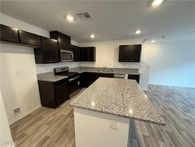 5943 Swift Lariat St, Las Vegas, NV 89113 - photo 6