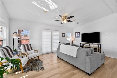 As you enter the home, the doorway leads to the living room.