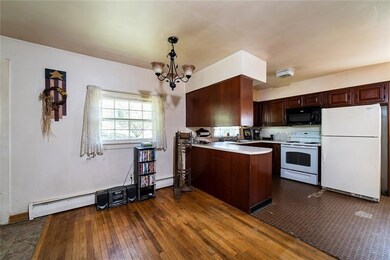 DINING AREA ADJACENT TO GALLEY KITCHEN