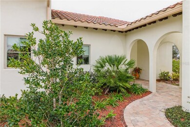 Breezeway that leads to the 2 car-garage