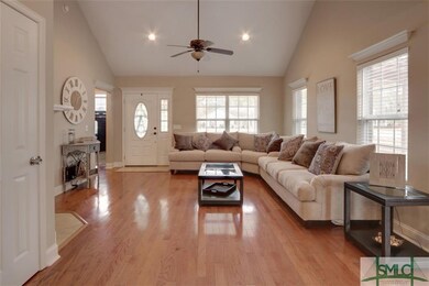 View from the kitchen of the front door, living ro