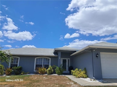 827 Alvin Ave, Lehigh Acres, FL 33971 - photo 2