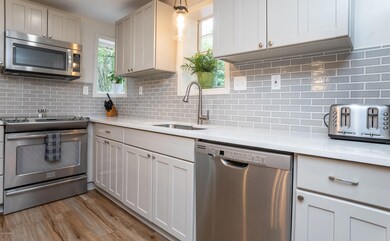 6. Kitchen view angled to stove