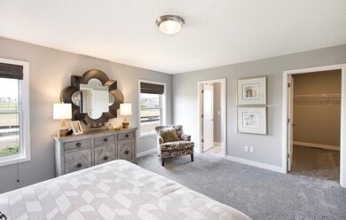 The master bedroom not only provides 2 beautiful w