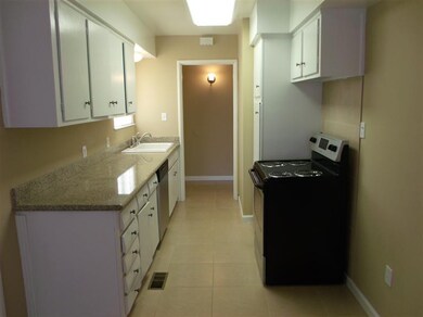 Looking back at kitchen from dining area, note new