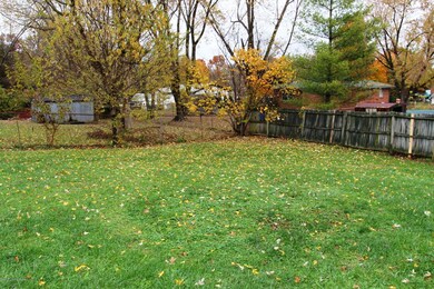 1/3 acre lot with fenced rear lawn