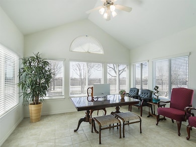 Home office featuring light tile patterned floors,