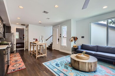 Living area featuring recessed lighting, stairway