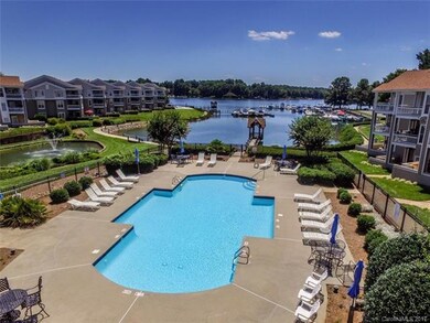 Pool for the community sits on the lake front to e