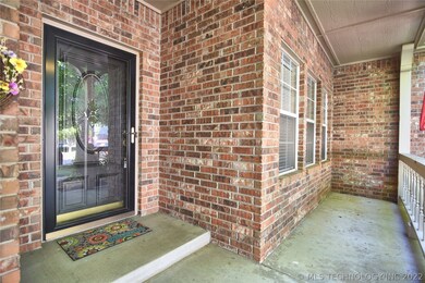 The Beautiful Brick Front Porch is calling to you.