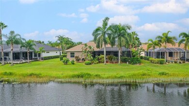 Serene and tranquil lake view from the oversized backyard - 364 Snapdragon Loop, Bradenton, FL 34212