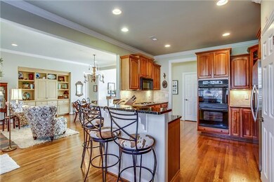 Kitchen with granite and double ovens & stainless 