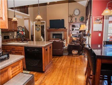 View into hearth room from kitchen.  Note wall of 