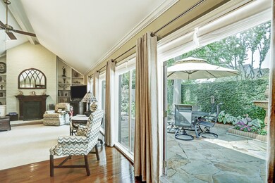 Another view of the living room showing the perfect patio for entertaining or just enjoying for your pleasure.