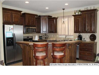 Kitchen with stainless appliances and gas stove