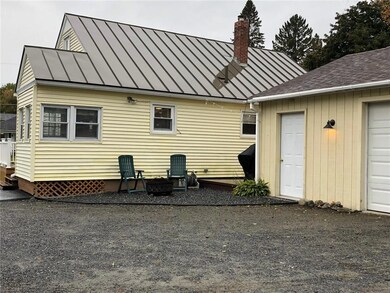 With a cozy outside sitting area to BBQ!