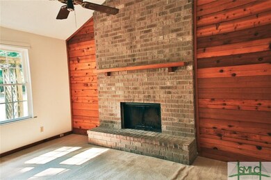 SPECTACULAR BRICK FIREPLACE IN THE DEN