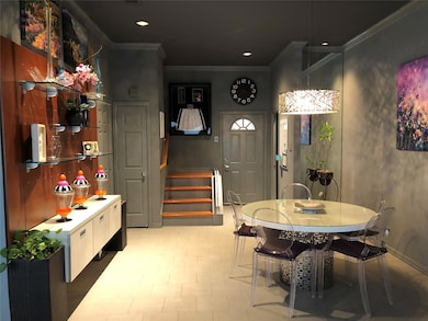 Dining space featuring recessed lighting, stairway