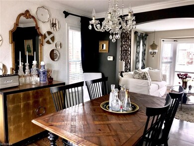 Dining room off living room connecting to kitchen 