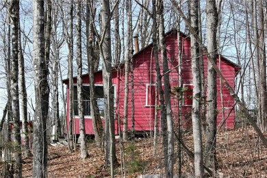 Close-up view showing the outhouse...