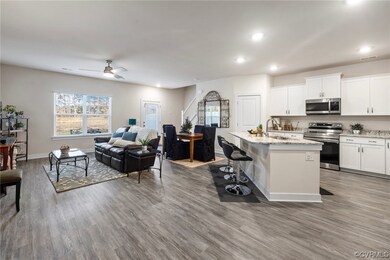 Kitchen featuring a breakfast bar, stainless steel