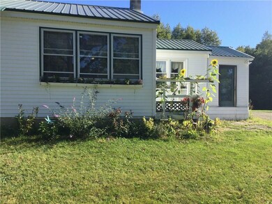 front of house with right side is...