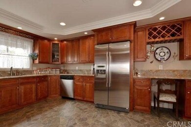 Abundant cabinetry with self closing drawers & gra