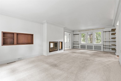 Large living room opens into the family room which