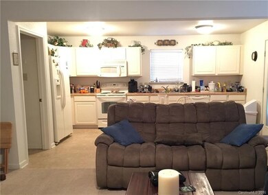 great room/den opens to kitchen