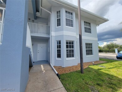 View of home's exterior featuring stucco siding and a lawn