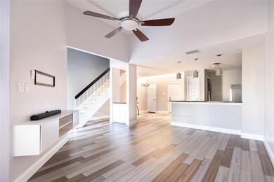 Unfurnished living room with visible vents, basebo