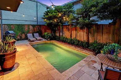 Private pool with paver patio and large trees for