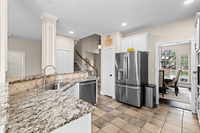 Kitchen with appliances with stainless steel finis