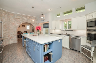 Chef-worthy kitchen comes complete with a Stainles