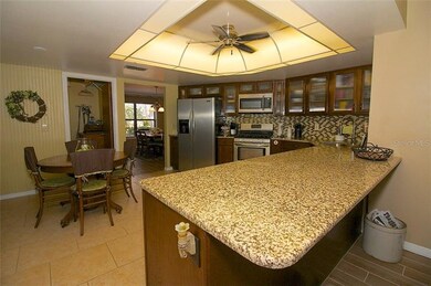 OVERSIZED KITCHEN WITH NEW GRANITE COUNTERTOPS AND