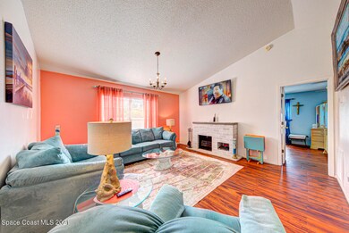 living room with vaulted ceiling