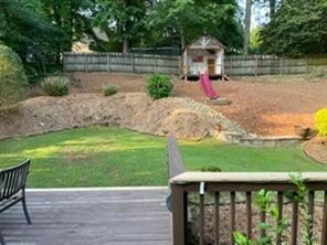 View of yard featuring a deck