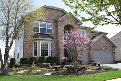 Professional landscaping with rock inlays, floweri