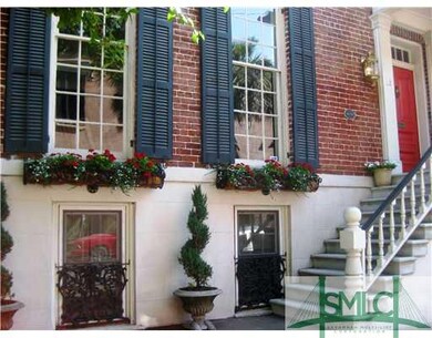 Exterior Front. Entry to parlor level with double 