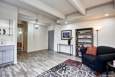 Sitting area off entry with wet bar