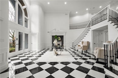 Impressive Foyer with soaring ceilings