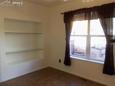 Dining Room with Built In Shelving