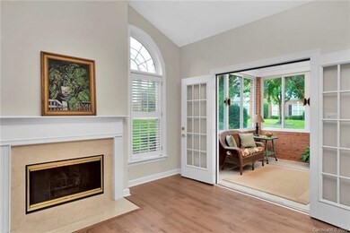 French doors lead to the sunroom