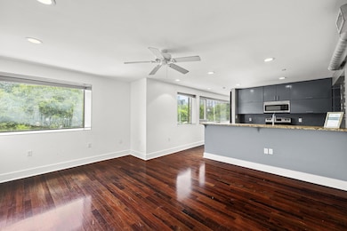 Unfurnished living room with recessed lighting, b