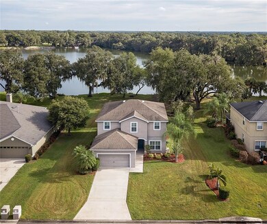 Arial view of home and lake